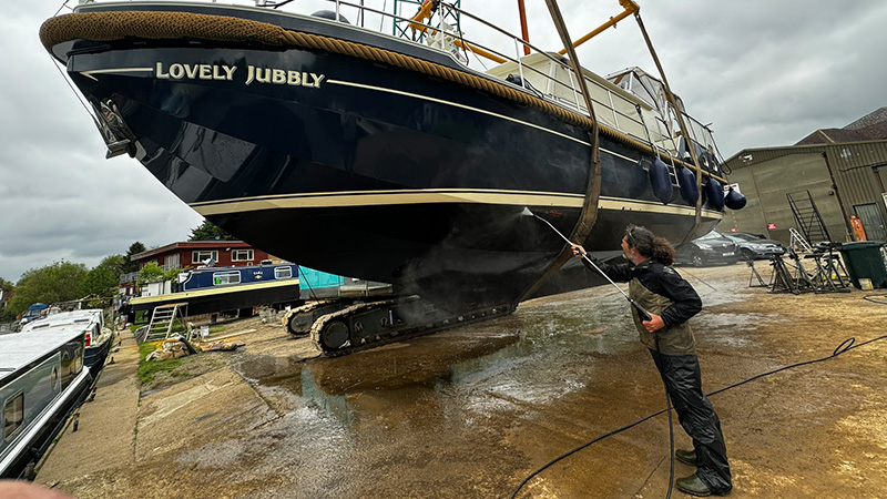 Boat hull pressure washing